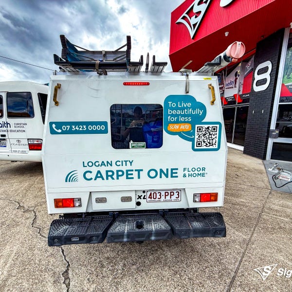 Vehicle graphics designed and installed by Signarama Springwood for Carpet One, featuring bold branding on a work vehicle for mobile advertising