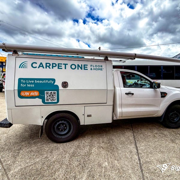 Vehicle graphics designed and installed by Signarama Springwood for Carpet One, featuring bold branding on a work vehicle for mobile advertising