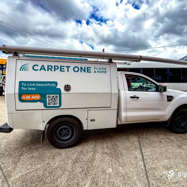 Vehicle graphics designed and installed by Signarama Springwood for Carpet One, featuring bold branding on a work vehicle for mobile advertising