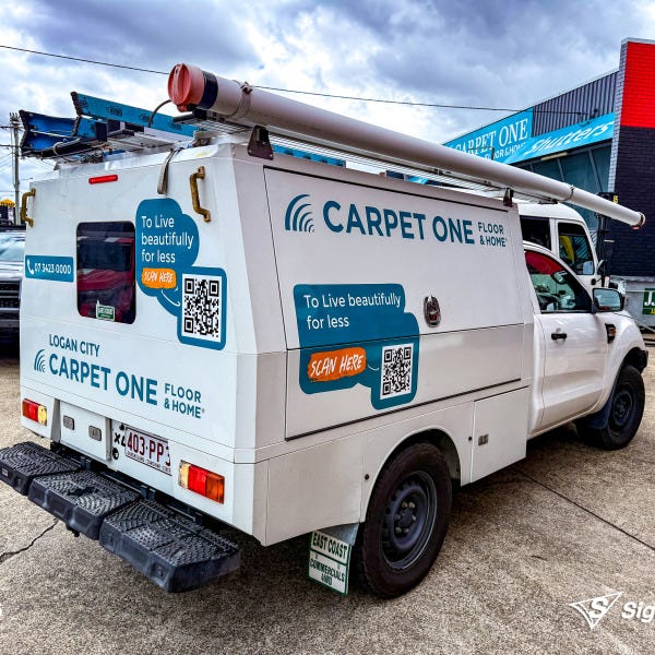 Vehicle graphics designed and installed by Signarama Springwood for Carpet One, featuring bold branding on a work vehicle for mobile advertising