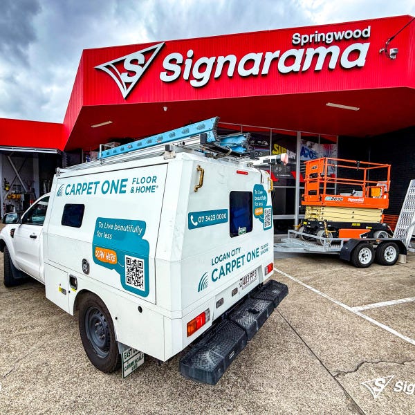 Vehicle graphics designed and installed by Signarama Springwood for Carpet One, featuring bold branding on a work vehicle for mobile advertising