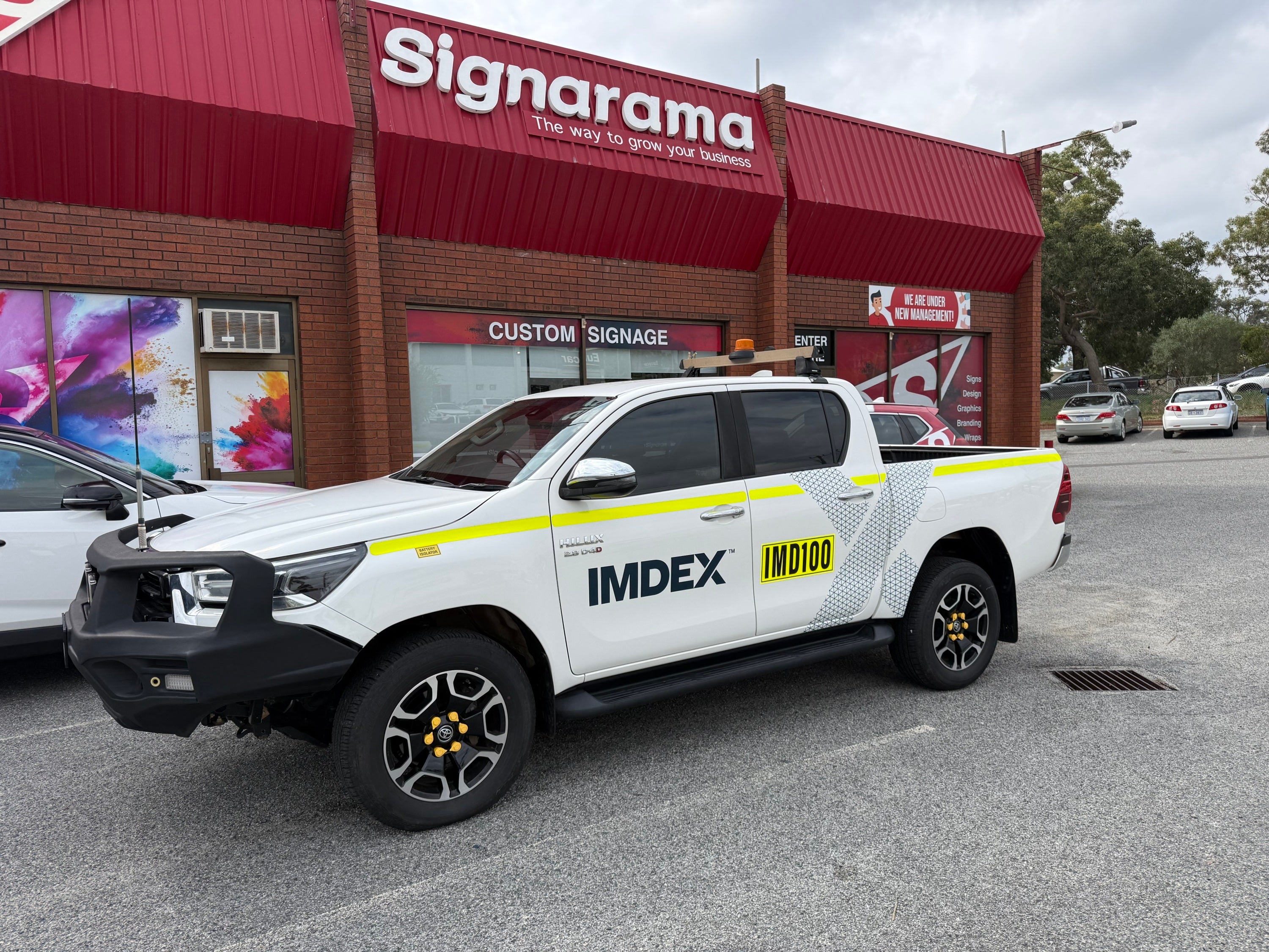 Fleet Signage Done Right: Vehicle Graphics for Imdex