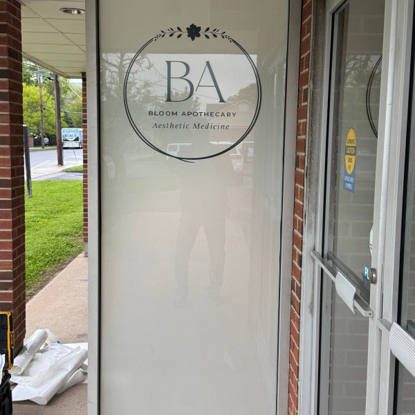 Custom Frosted Window Graphics & Storefront Branding for Bloom Apothecary Aesthetic Medicine