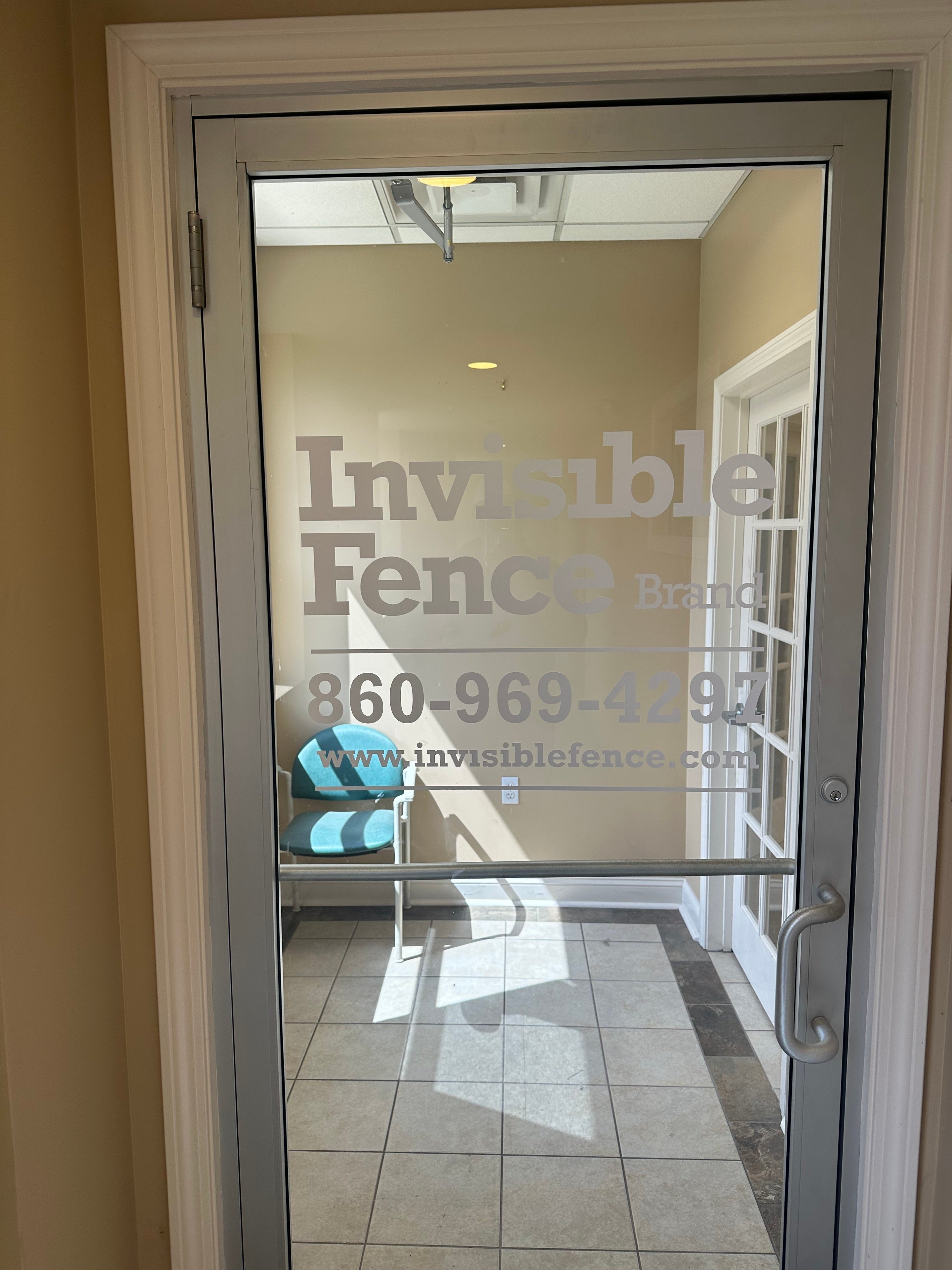 Custom Door & Window Graphics Installation for Invisible Fence in Berlin, CT