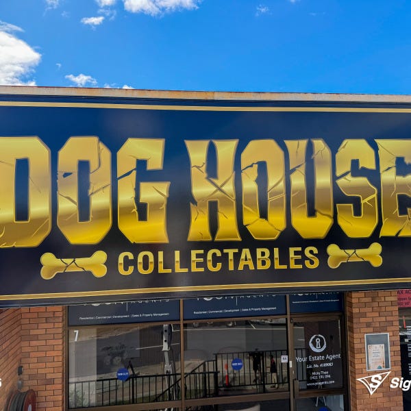 Sailtrack banner and custom window graphics created and installed by Signarama Springwood for Dog House Collectables storefront signage