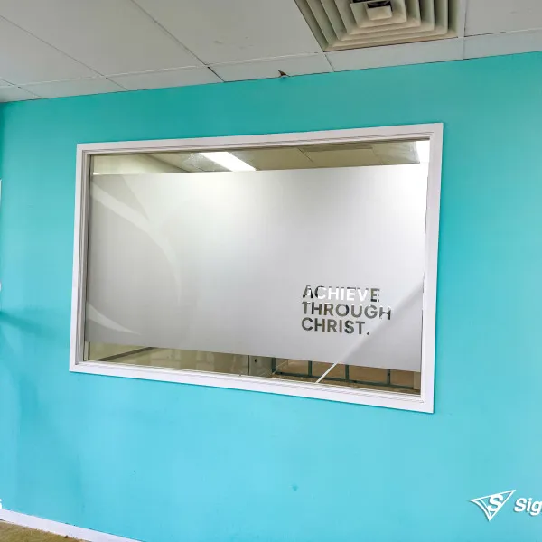 Printed and cut window frosting installed by Signarama Springwood for Faith Christian School featuring custom frosted window graphics for privacy and branding