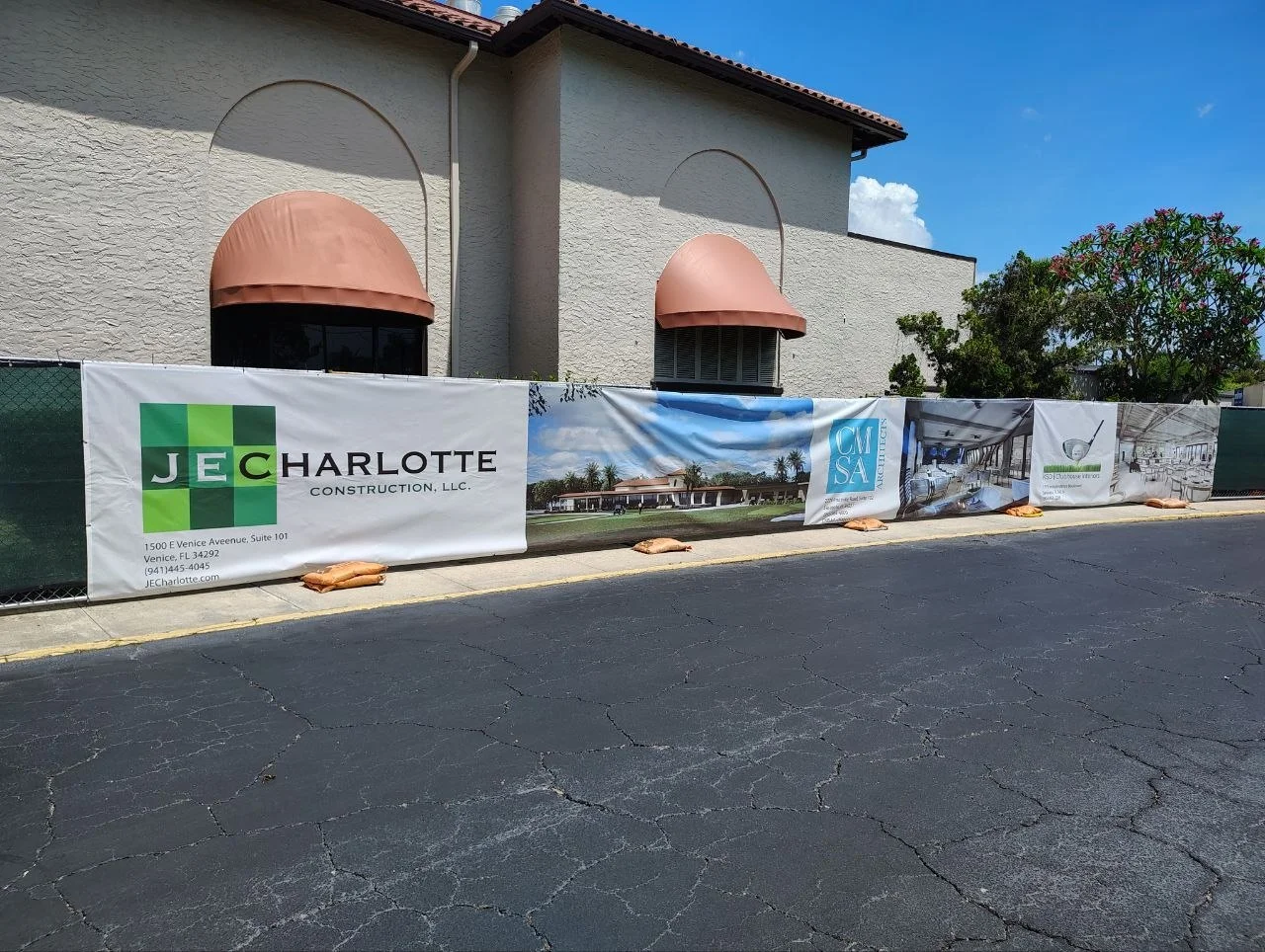 Custom Mesh Construction Banner for JE Charlotte's project renovating Sara Bay Country Club Clubhouse