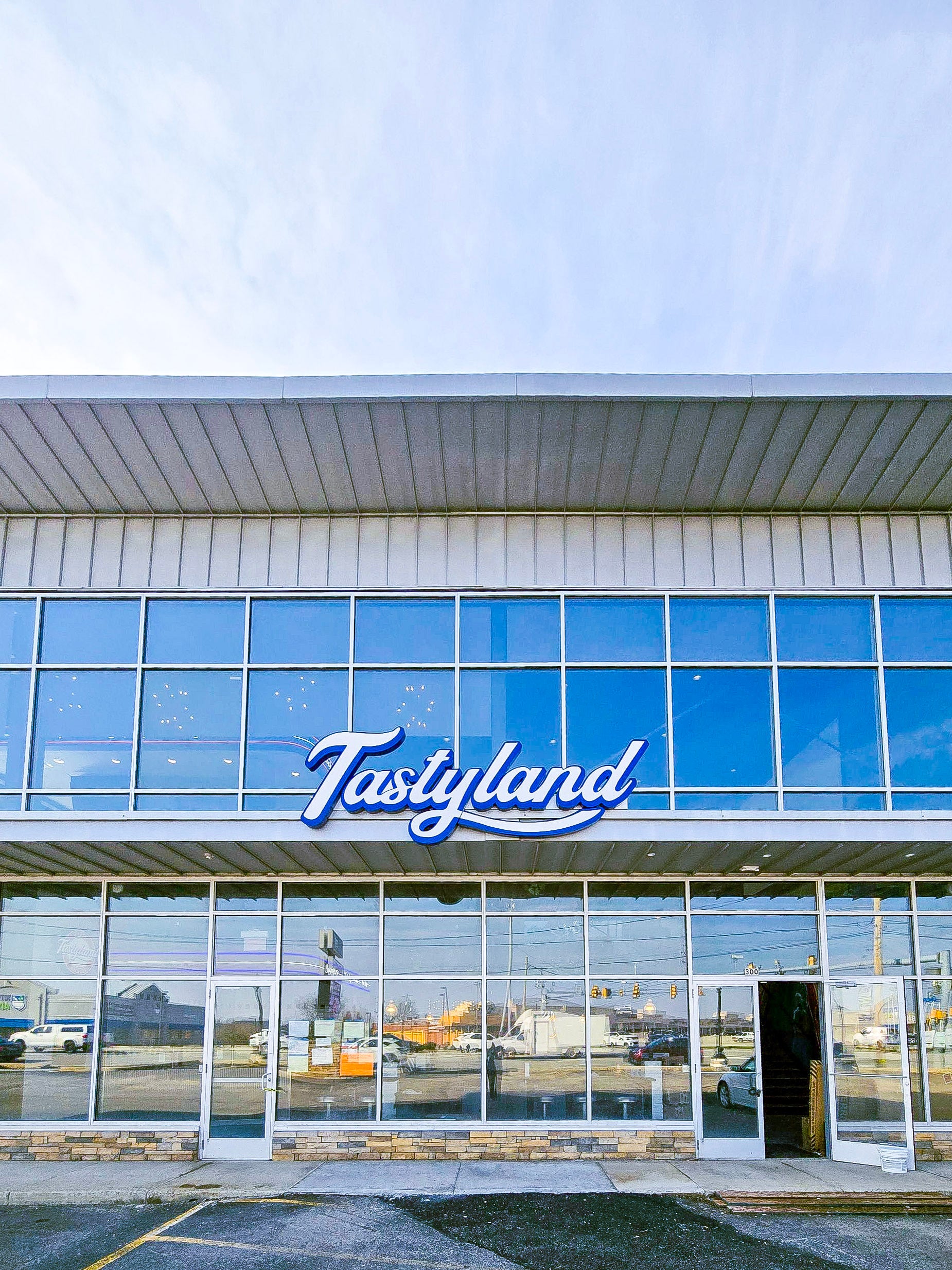 Tastyland Brings the Glow: LED Neon Interiors, Illuminated Signage & Cinematic Exterior Impact