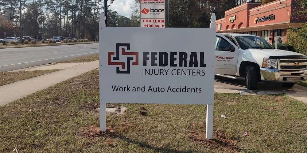 white pylon sign