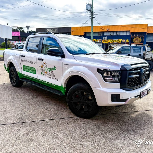 Custom vehicle graphics created and installed by Signarama Springwood for Organic Pest Control work vehicle branding