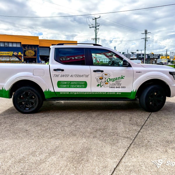 Custom vehicle graphics created and installed by Signarama Springwood for Organic Pest Control work vehicle branding