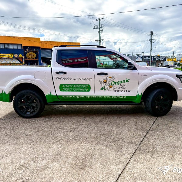 Custom vehicle graphics created and installed by Signarama Springwood for Organic Pest Control work vehicle branding