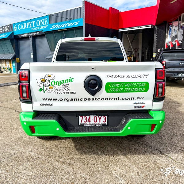 Custom vehicle graphics created and installed by Signarama Springwood for Organic Pest Control work vehicle branding