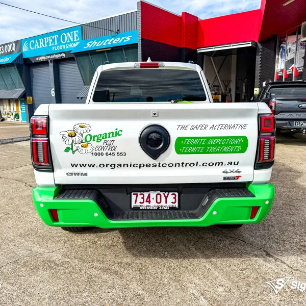 Custom vehicle graphics created and installed by Signarama Springwood for Organic Pest Control work vehicle branding
