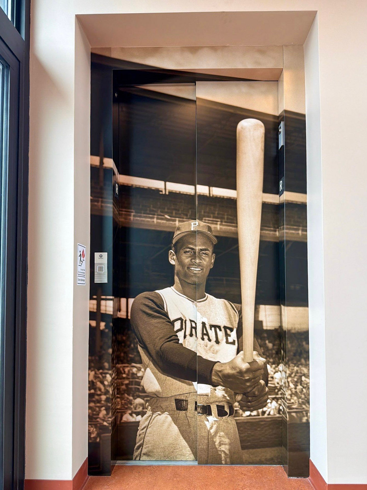 Roberto Clemente Museum Elevator Doors Transformed with Custom Vinyl Graphics in Pittsburgh, PA