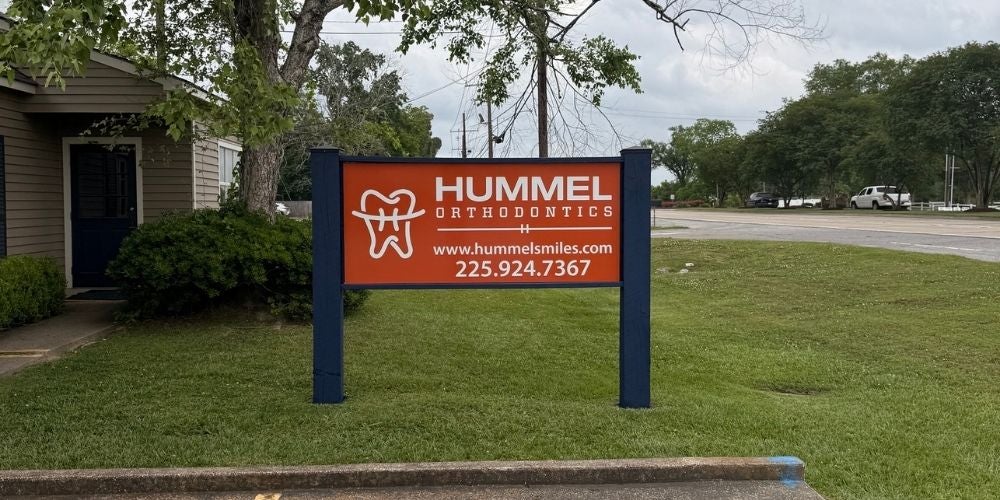 white pylon sign