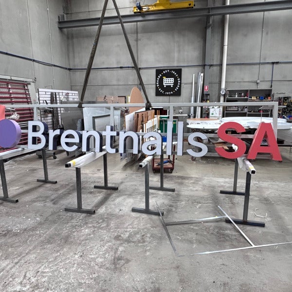 rentnalls' New 3D Illuminated Roof Signage Makes a Bold Statement
