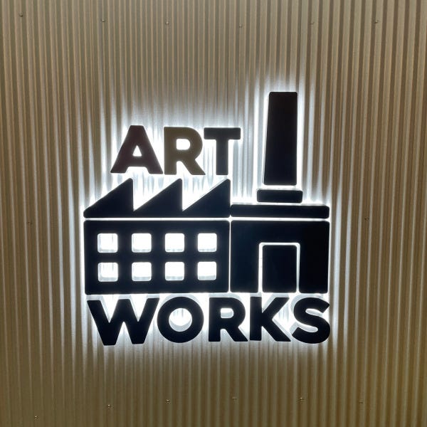 Custom Backlight Sign on Curved Wall