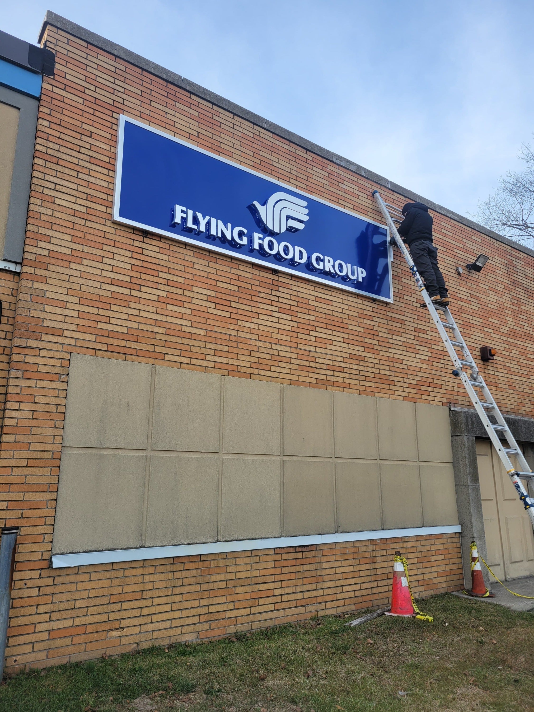 Custom 3-Dimensional Building Sign for Flying Food Group