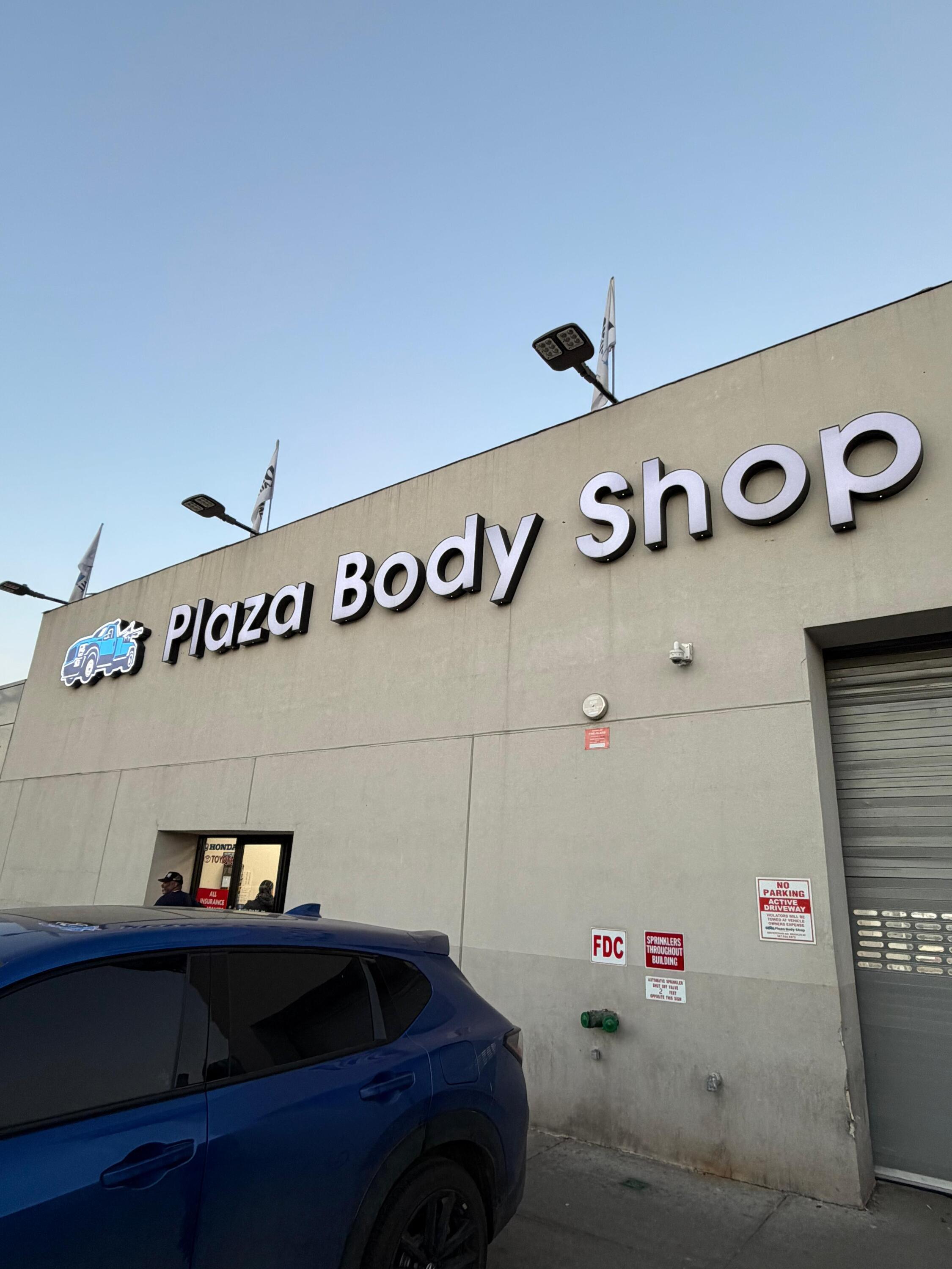 Custom Illuminated Channel Letter Sign for Plaza Body Shop in Brooklyn