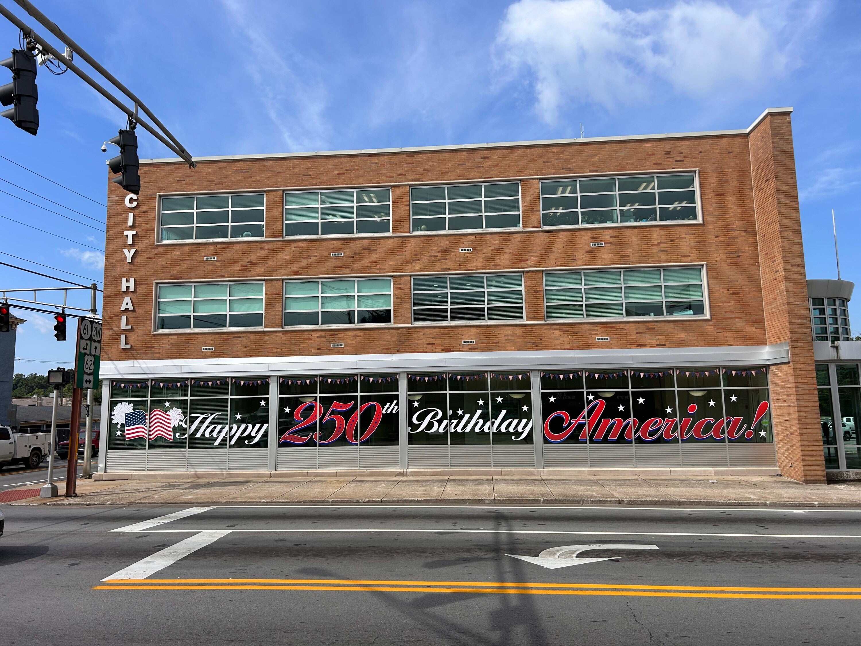 Celebrating America’s 250th Birthday with a Landmark Window Graphic Installation at City Hall