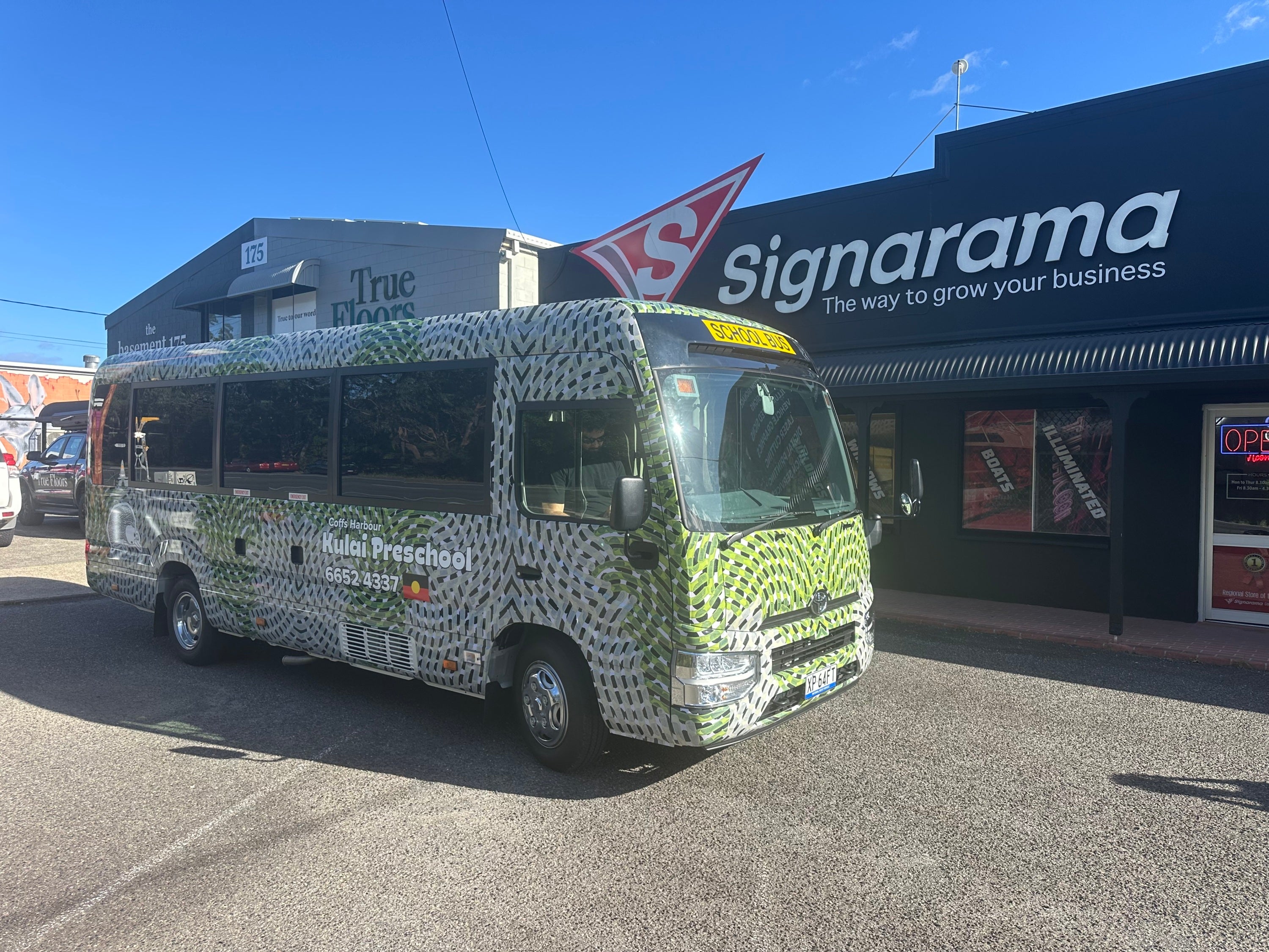 Make Every Journey Count with a Graphic Branded Transporter Bus! 