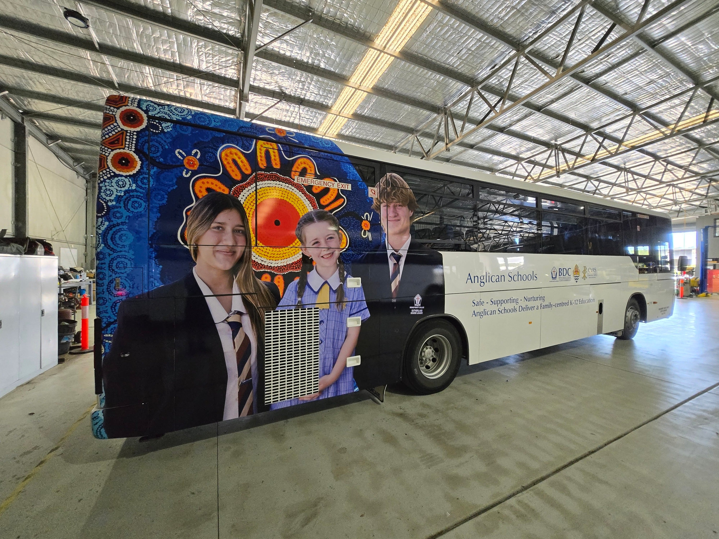 Make Every Journey Count with a Graphic Branded Transporter Bus! 