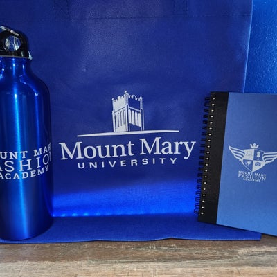 https://cdn.gorilladash.com/images/media/21507879/fully-promoted-usa-mount-mary-university-branded-products-flatlay-square-6a3d79ac4bc3a.jpg?auto=webp&crop=1%3A1%2Csmart&width=400
