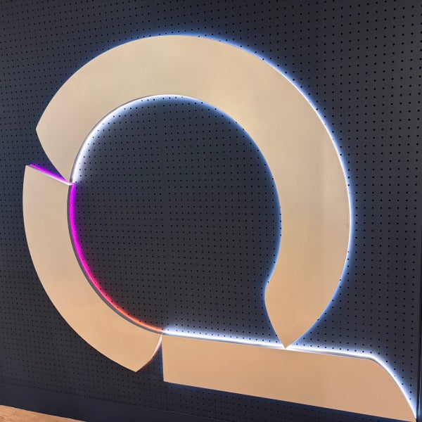 Two Reception Areas, Two Big Wow Moments: Our Latest Illuminated Sign Installs