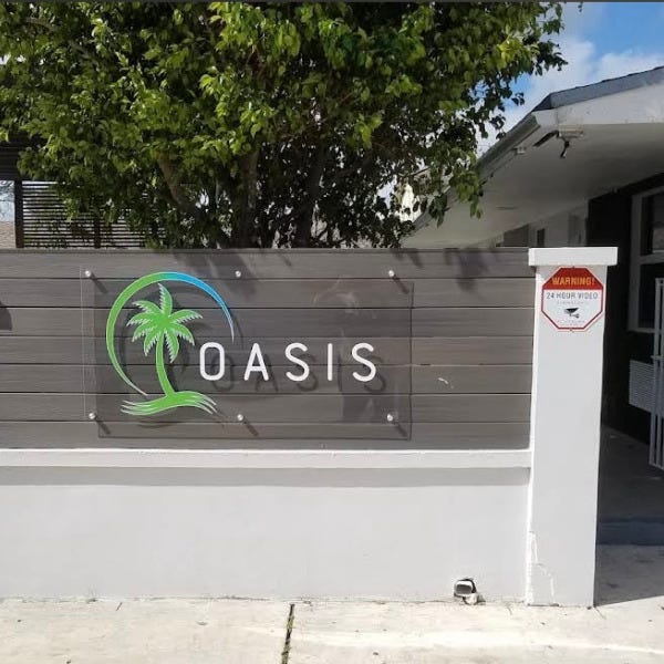 oasis acrilic sign