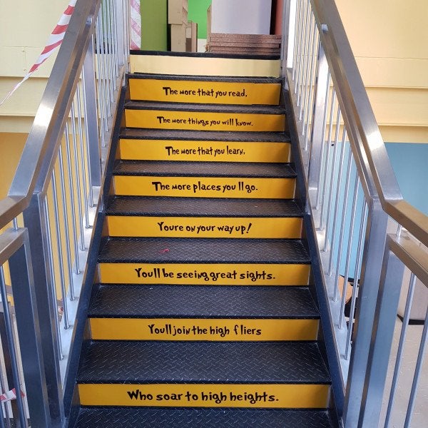 Acm Boards with printed clear vinyl and laminated fixed to stairs.