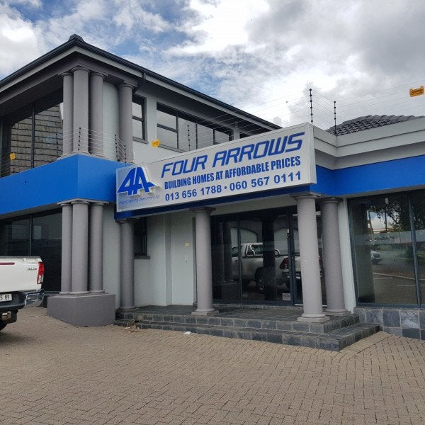 Building Signs | Four Arrows