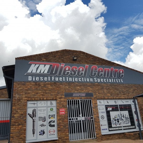 Building Signs | KM Diesel