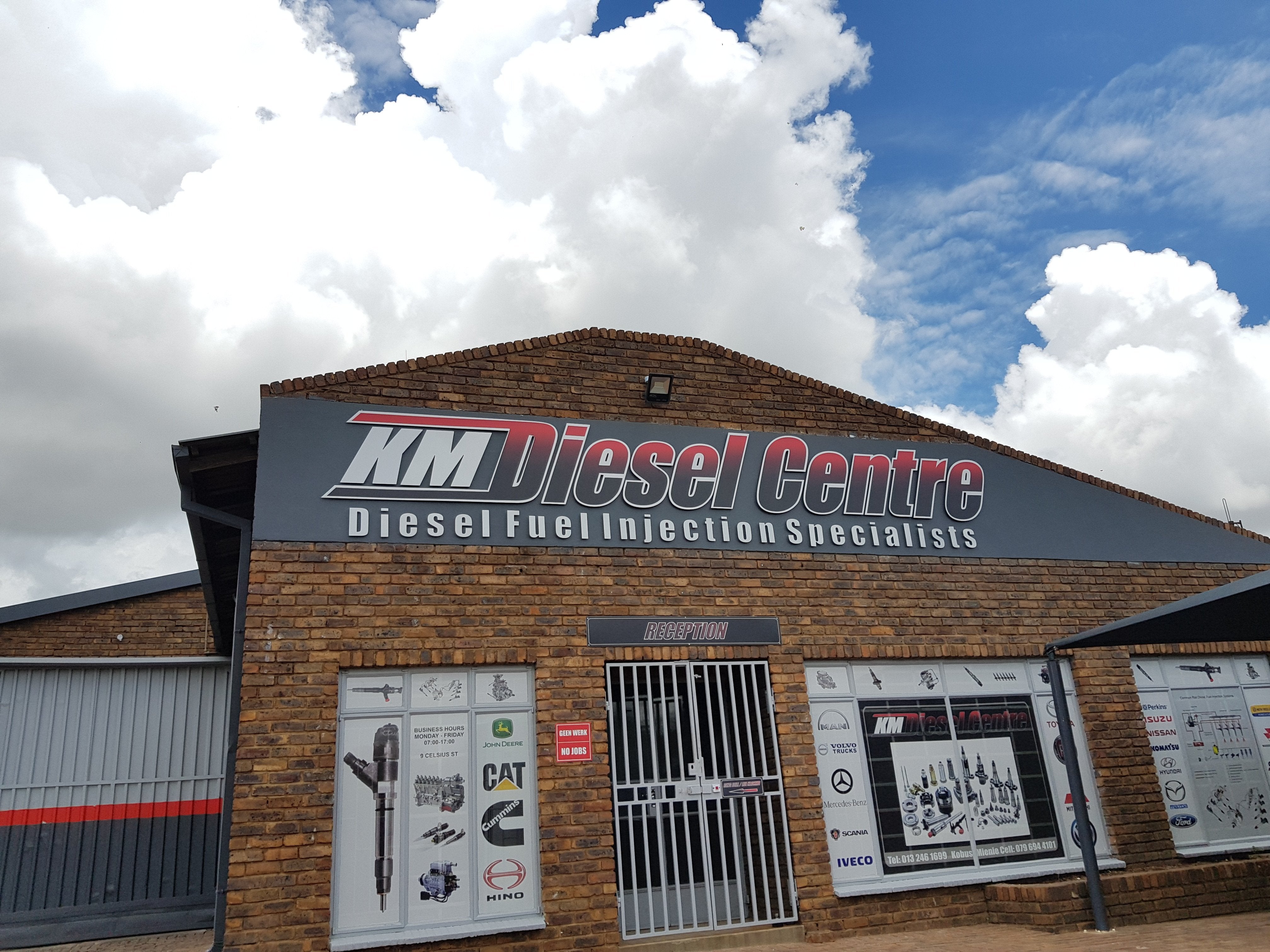 Building Signs | KM Diesel