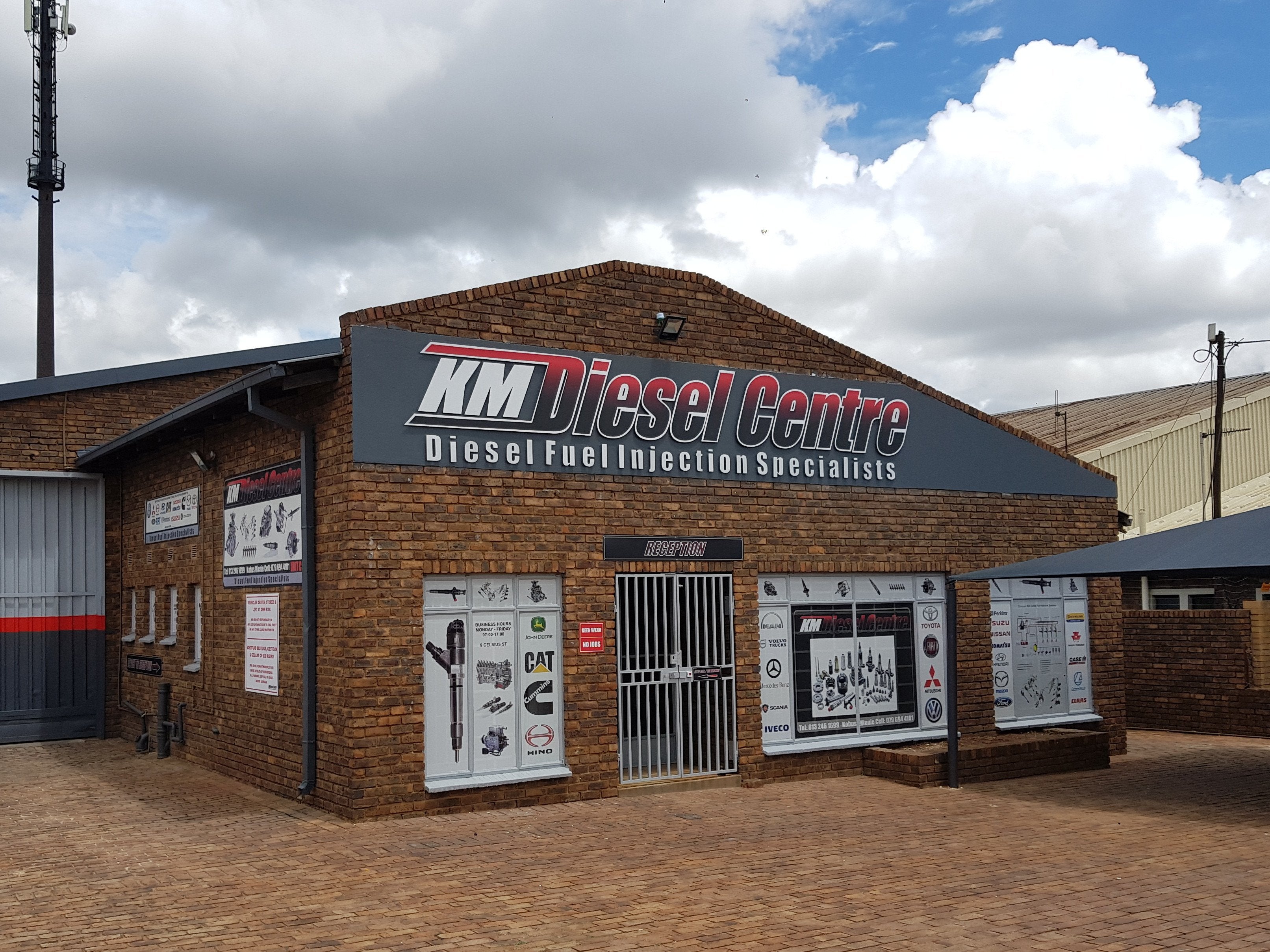 Building Signs | KM Diesel