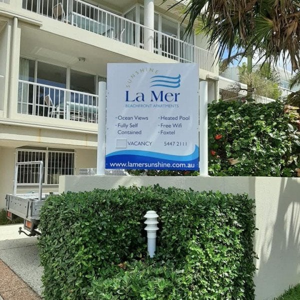 New signage for La Mer Beachfront Apartments