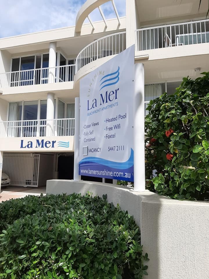 New signage for La Mer Beachfront Apartments