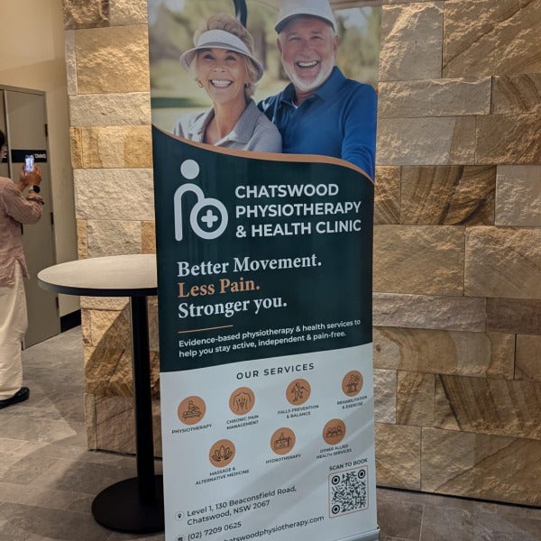 Professional Pull-Up Banners & Window Graphics Installation for a Modern Health Clinic