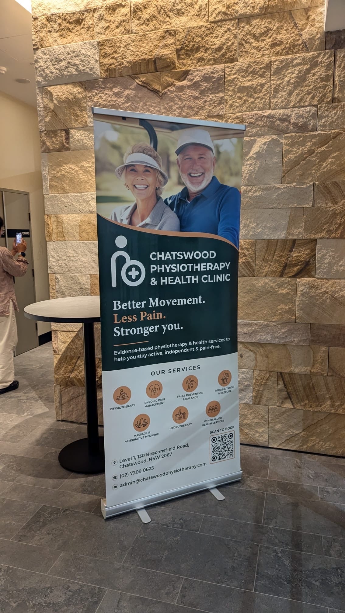 Professional Pull-Up Banners & Window Graphics Installation for a Modern Health Clinic