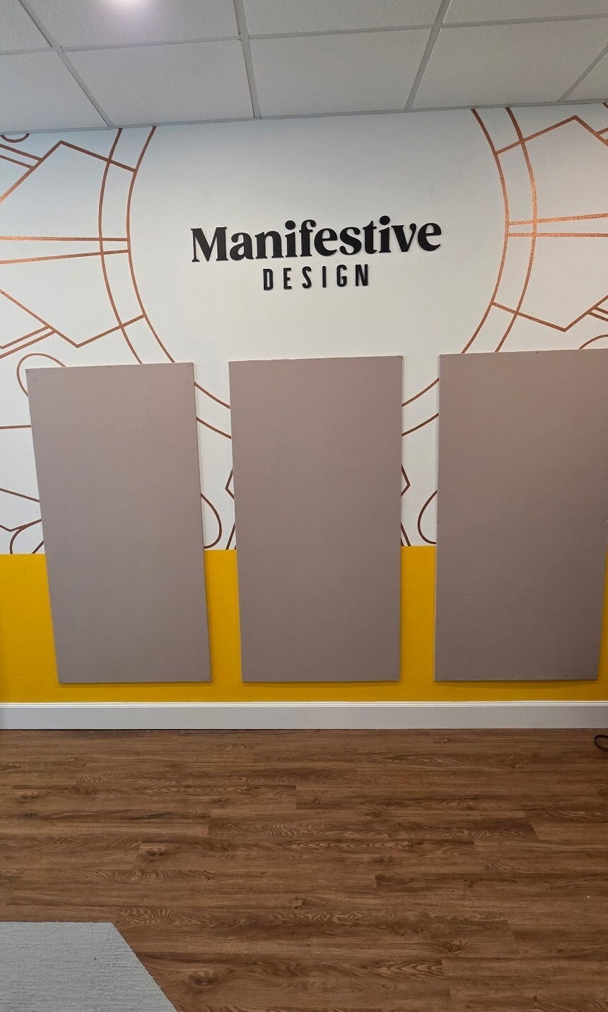 New Location, New Look: Bringing Manifestive's Brand to Life with Interior & Exterior Signage