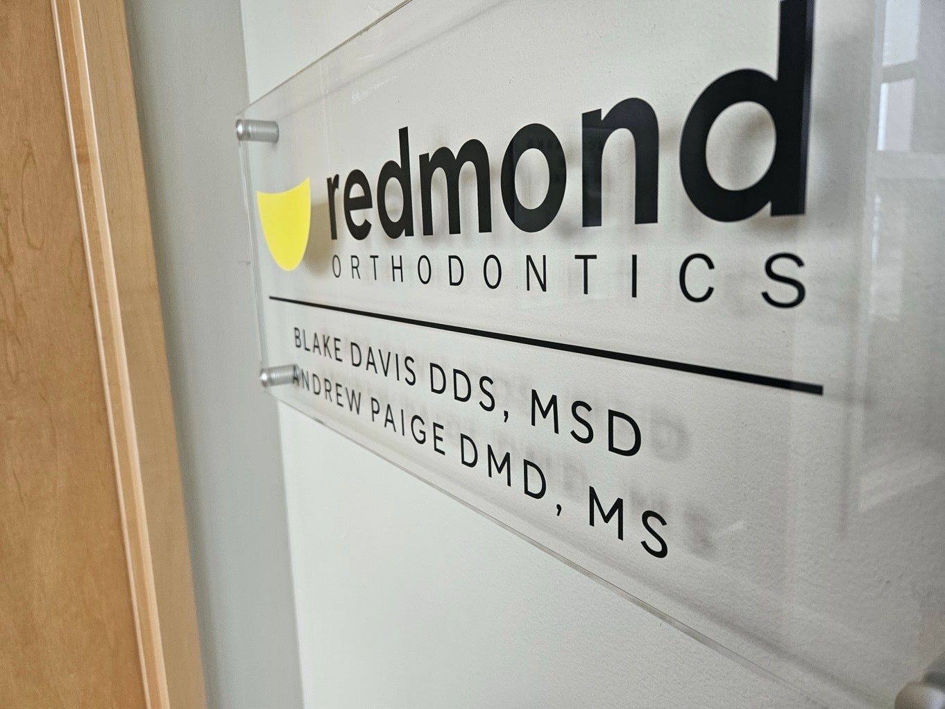 Redmond Orthodontics Lobby Sign: Why Branded Reception Signage Matters for Your Patient Experience - Redmond, WA