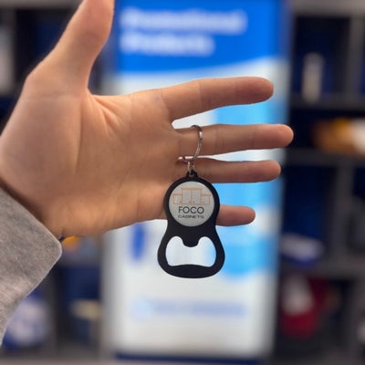https://cdn.gorilladash.com/images/media/22052339/fully-promoted-usa-custom-keychain-bottle-opener-for-foco-cabinets-square-6a4fb03531def.jpg?auto=webp&crop=1%3A1%2Csmart&width=400