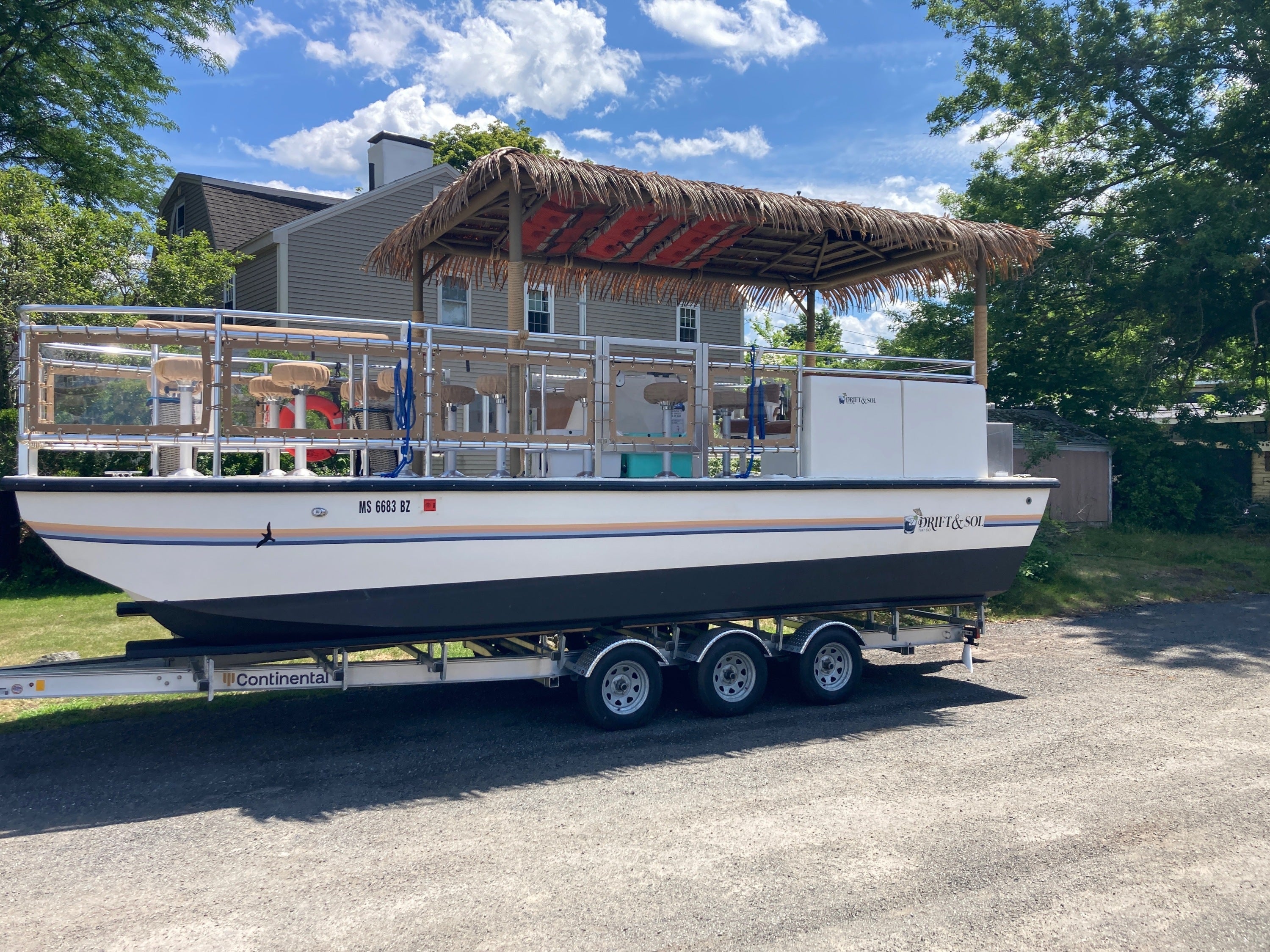 Drift & Sol Tiki Boat Graphics | Custom Boat Wrap & Marine Graphics on the North Shore