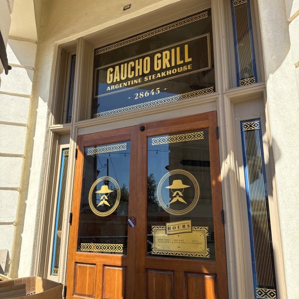 Custom Vinyl Window and Door Graphics for Gaucho Grill Argentine Steakhouse | Signarama Temecula