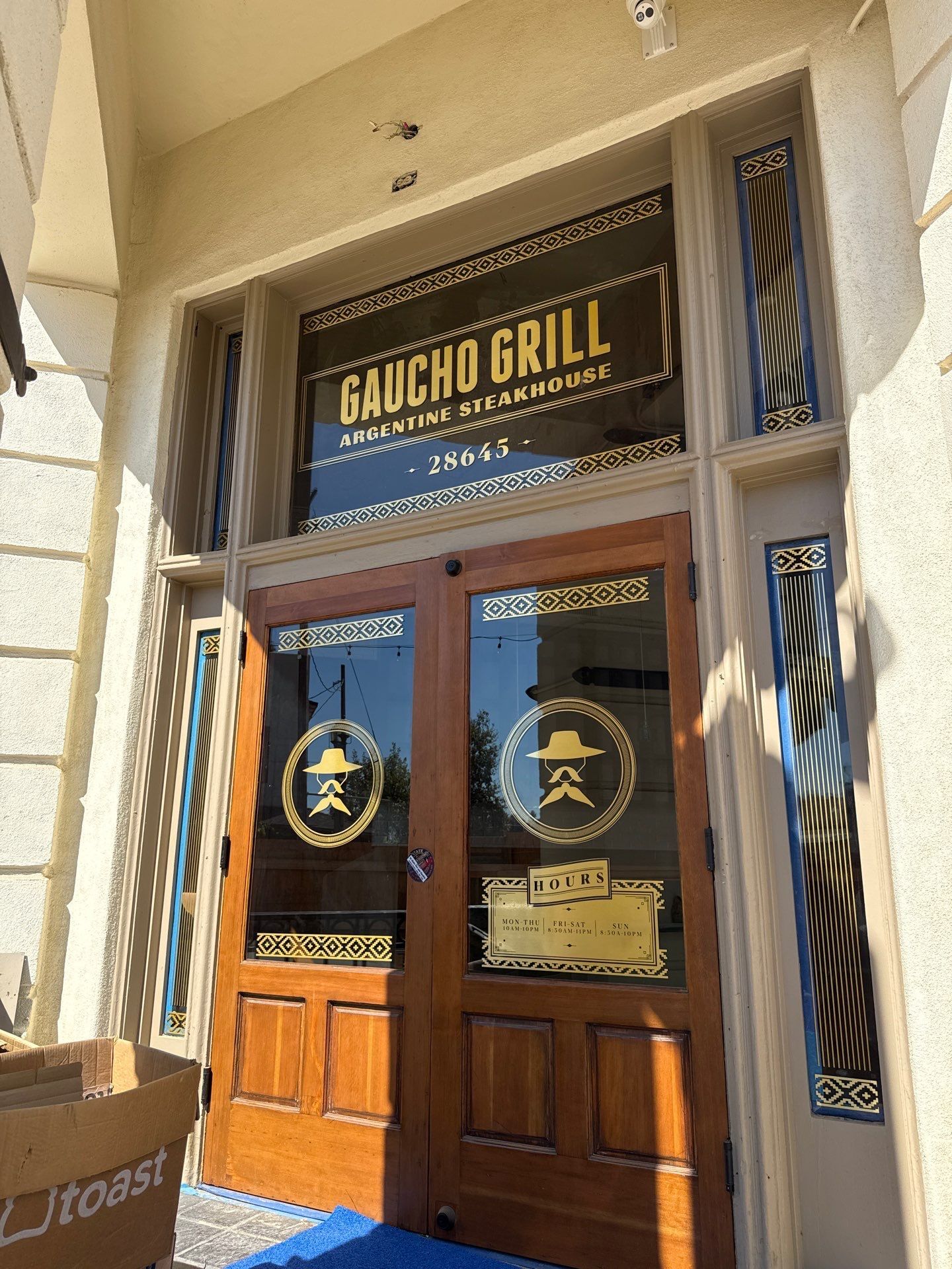 Custom Vinyl Window and Door Graphics for Gaucho Grill Argentine Steakhouse | Signarama Temecula