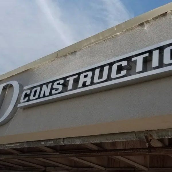 kd construction wall mounted sign