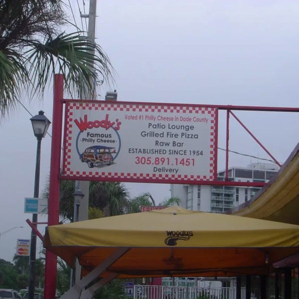 woody's philly cheese sign