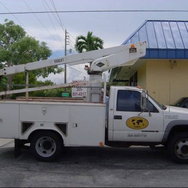 old signarama bucket truck