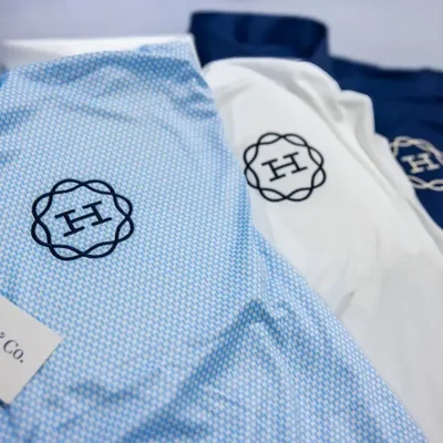 https://cdn.gorilladash.com/images/media/22073758/fully-promoted-usa-custom-embroidered-collars-co-dress-shirts-square-6a5a670e9be93.webp?auto=webp&crop=1%3A1%2Csmart&width=400