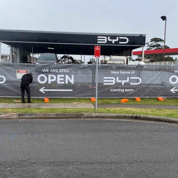 Custom Mesh Banner Installation for Construction Site Fencing